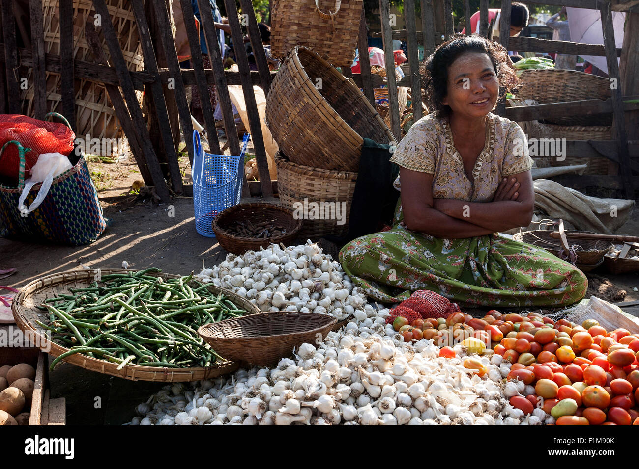 Market, vegetable market, indigenous woman selling garlic, tomatoes, beans, Mandalay Division, Bagan, Mandalay Division, Myanmar Stock Photo