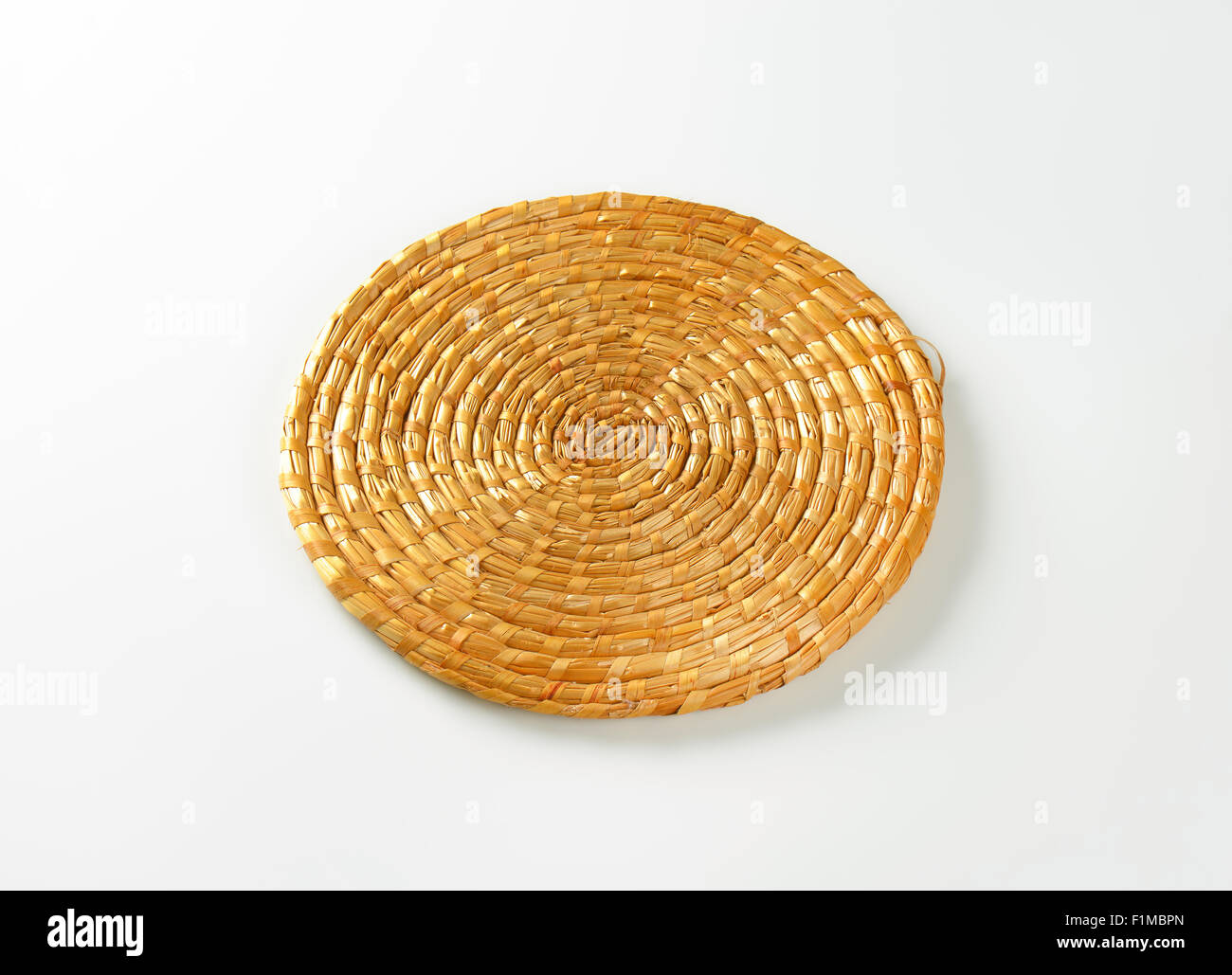 round wicker mat on white background Stock Photo Alamy