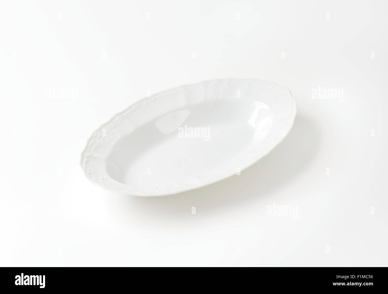 white decorative plate on white background Stock Photo Alamy