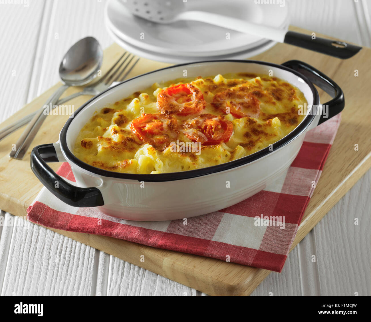 Macaroni cheese baked in casserole dish Stock Photo