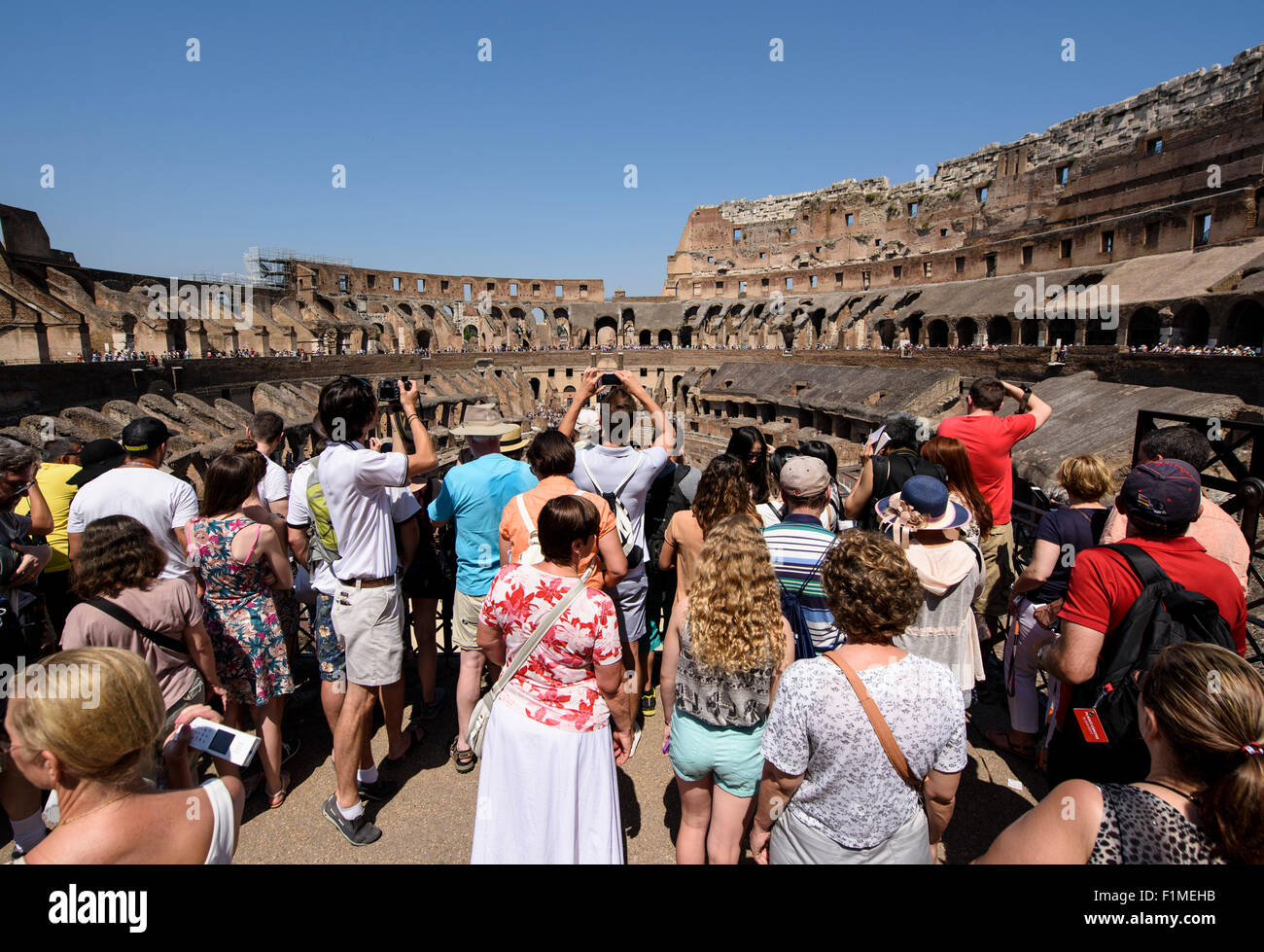 Rome. Italy. Crowds of tourists inside the Roman Colosseum. Stock Photo