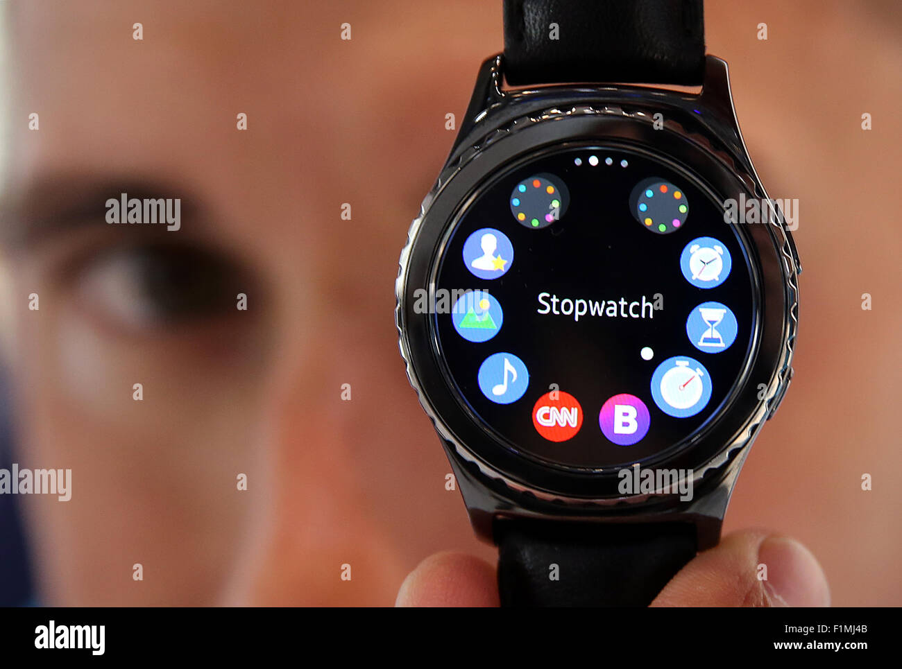 Berlin, Germany. 04th Sep, 2015. A man shows a SmartWatch at the