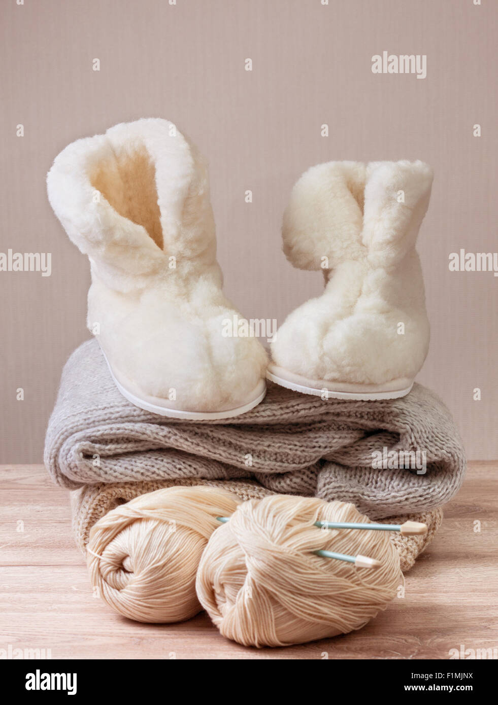 Pair of warm winter sheepskin slippers alpaca wool yarn pile