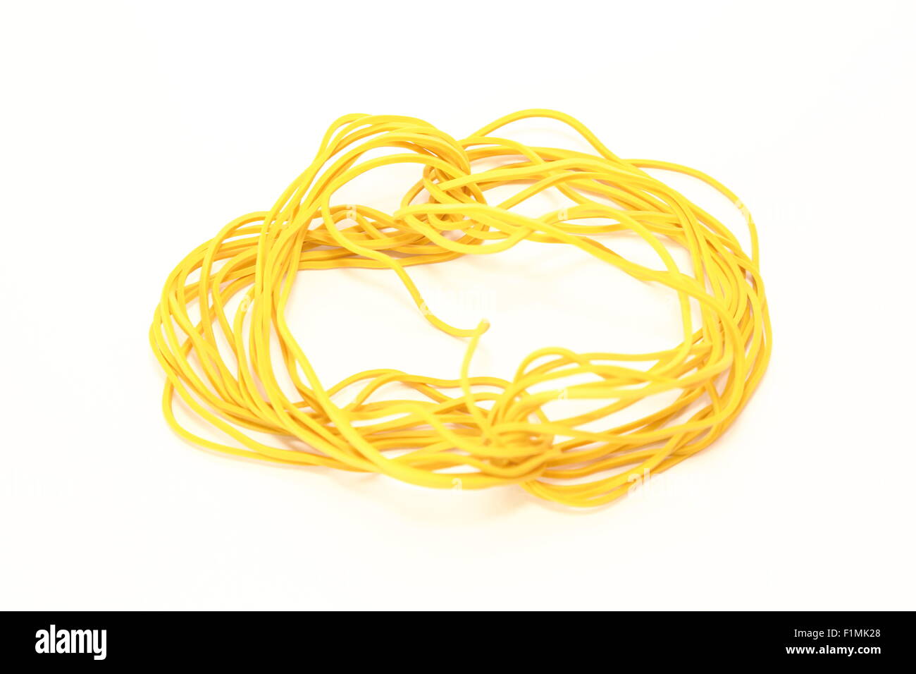 Yellow Rubber Bands Close Up With Hand Isolated On White Background Stock  Photo - Download Image Now - iStock