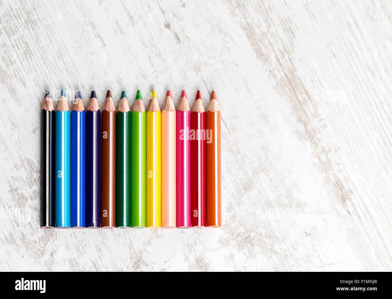Colorful pencils crayons on white table hi-res stock photography and ...