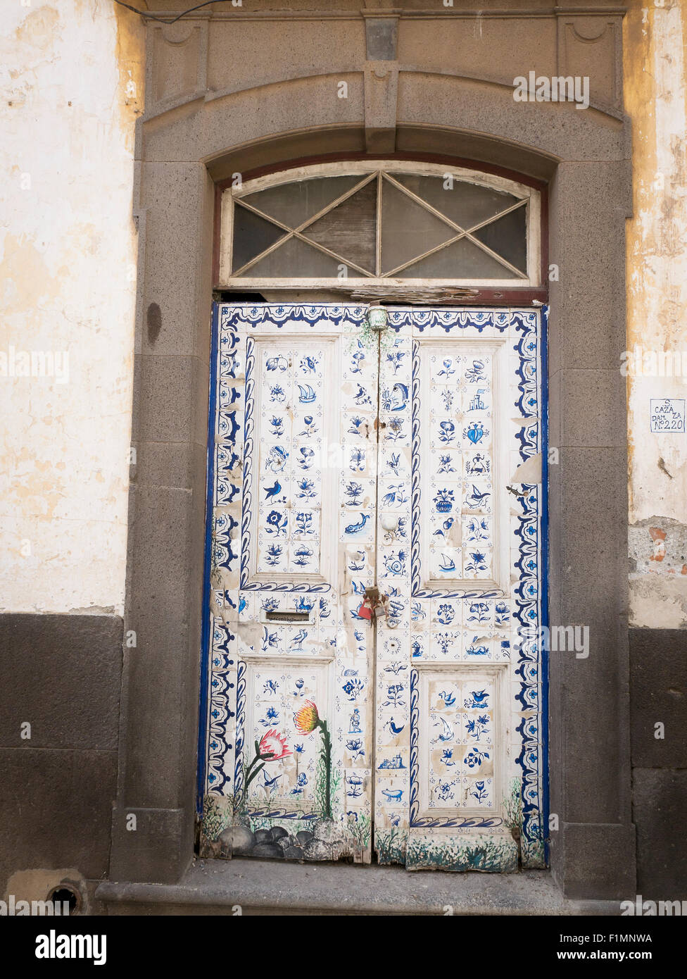 The Painted Doors of Funchal Old Town, Madeira, Portugal. Art of open doors project in Rua de Santa Maria of Funchal Stock Photo