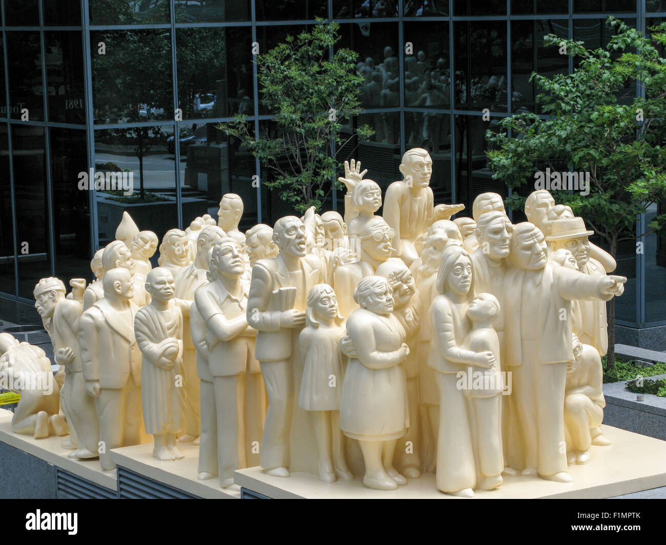 The 'illuminated Crowd' statue in downtown Montreal. Created by Raymond