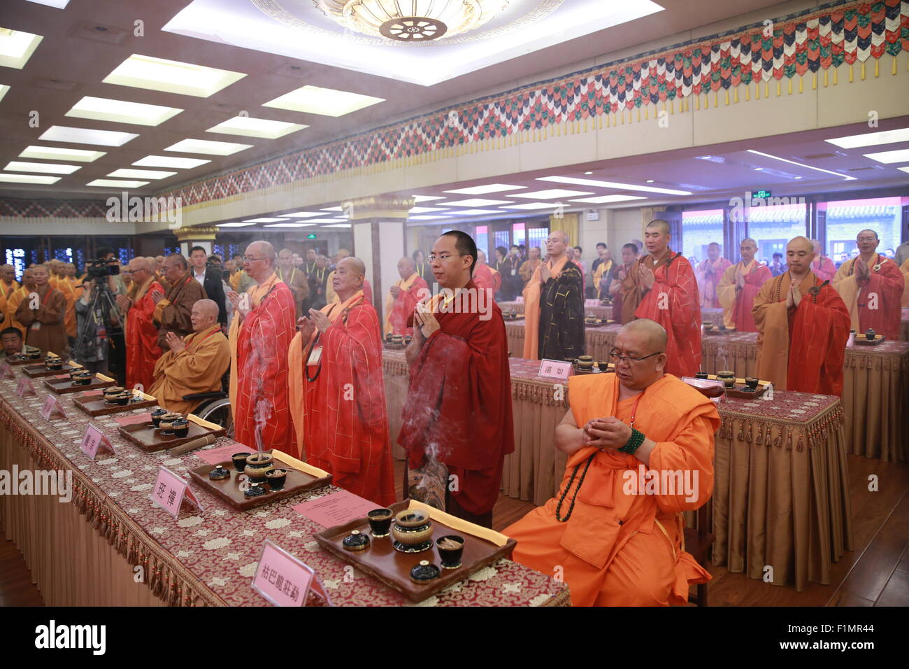 Beijing, China. 4th Sep, 2015. Buddhists hold the praying ceremony at