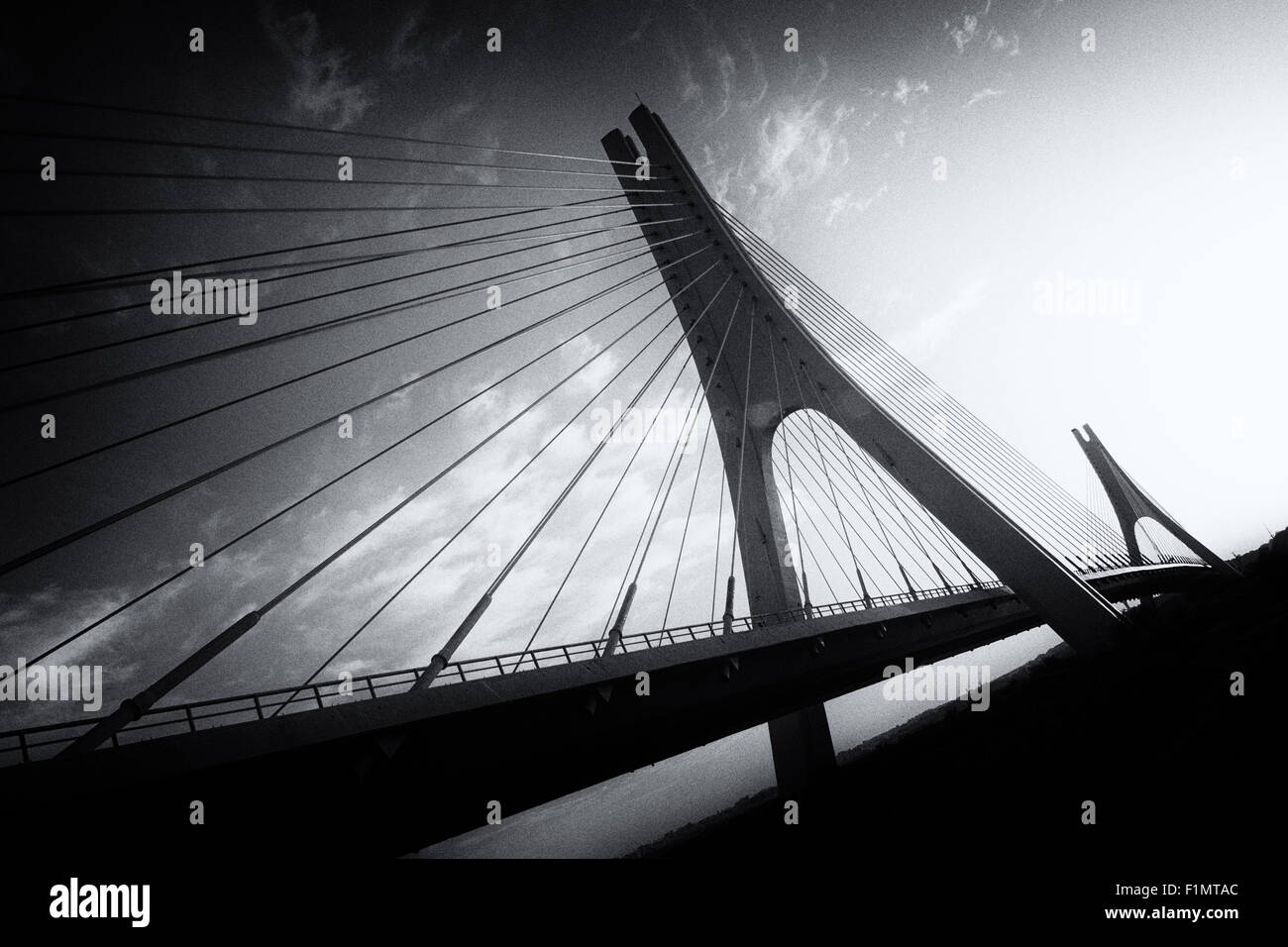 Black and white photo of bridge over river in various perspectives ...
