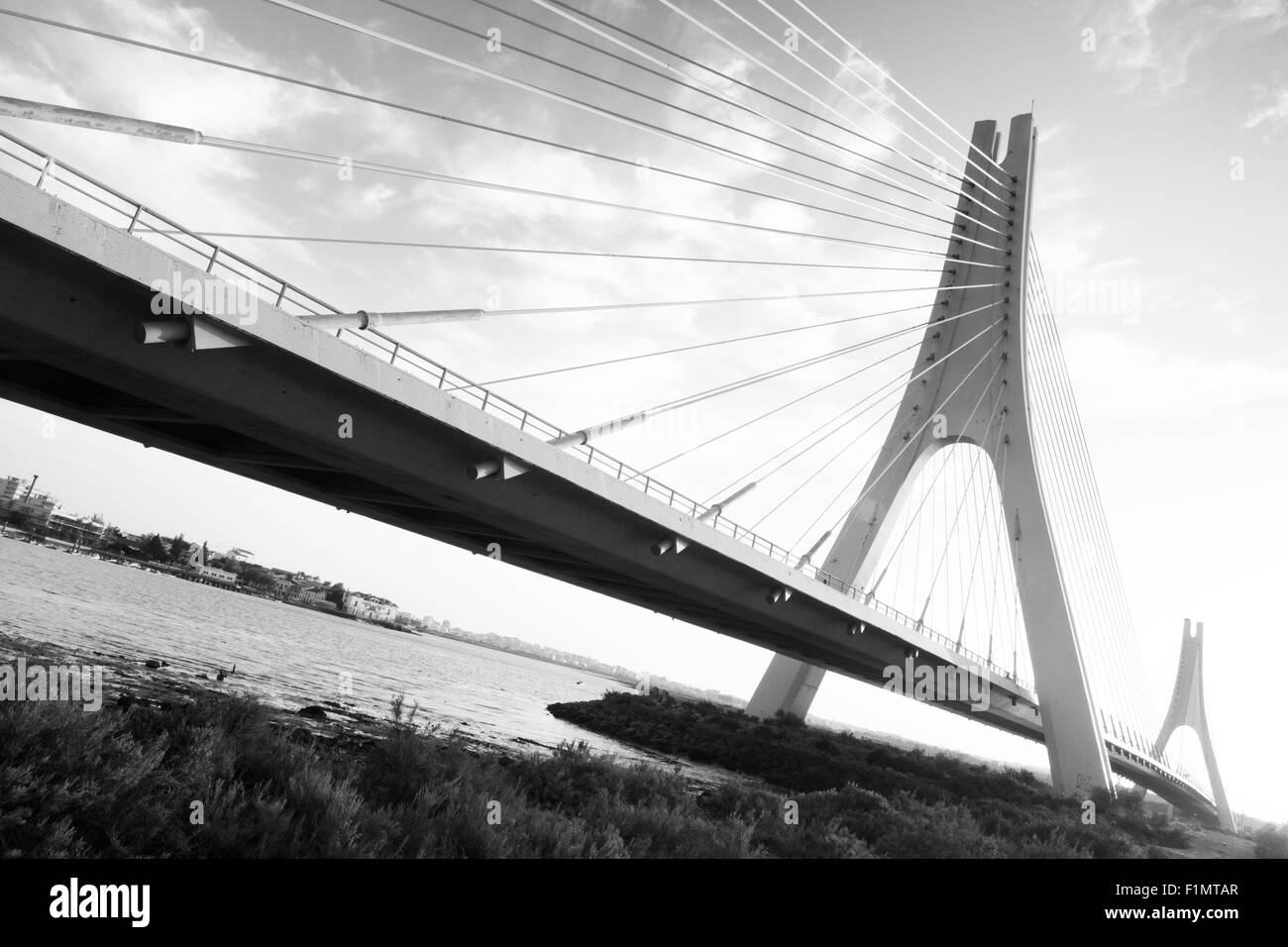 Black and white photo of bridge over river in various perspectives ...