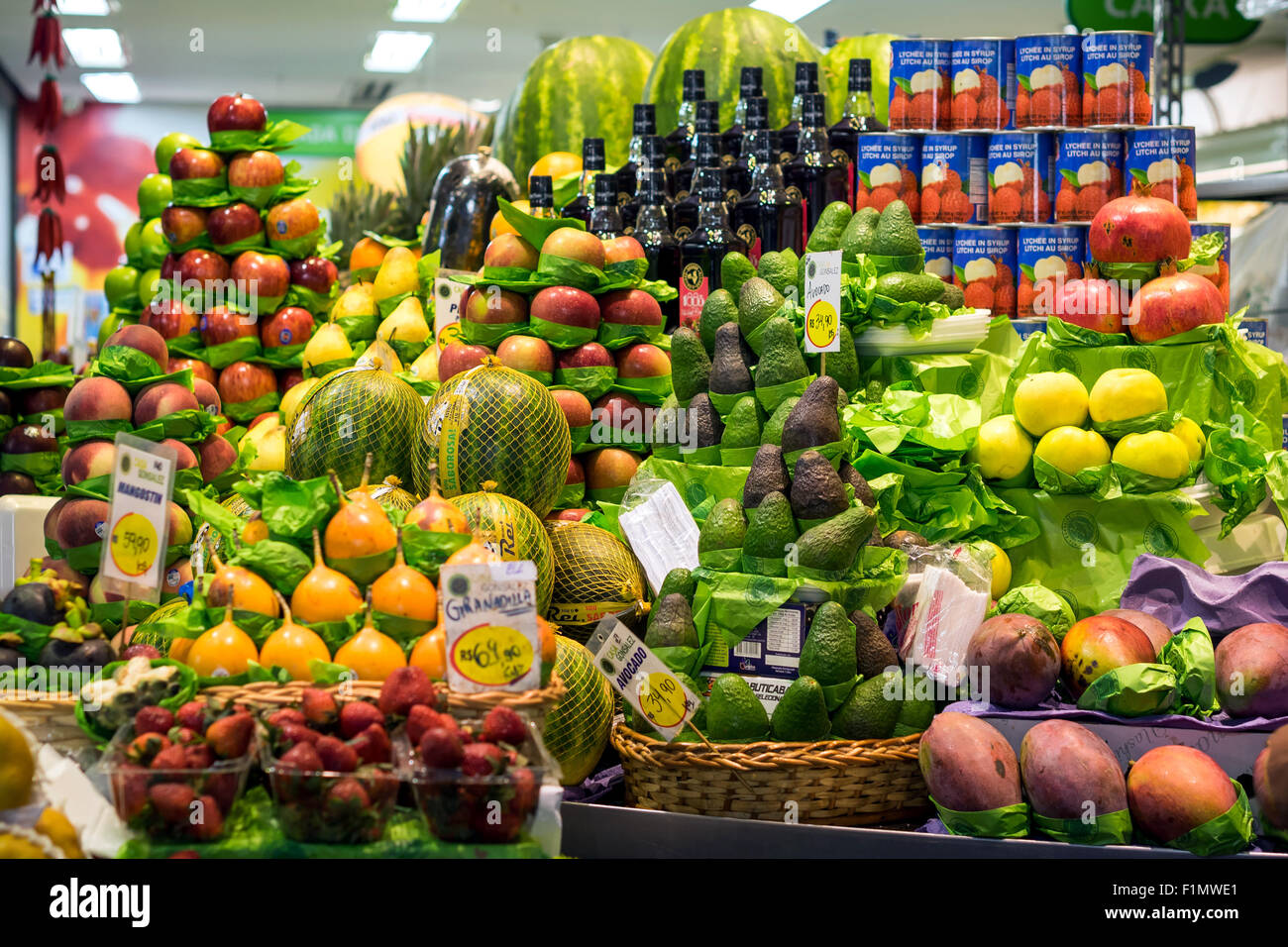 Colorful fresh fruit stand at the traditional Municipal Market (Mercado Municipal), or Mercadao, in Sao Paulo, Brazil. Stock Photo