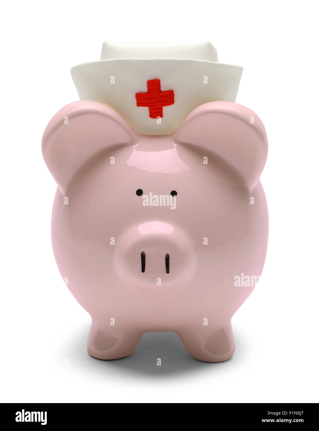 Piggy Bank with Nurse Hat Isolated on White Background. Stock Photo