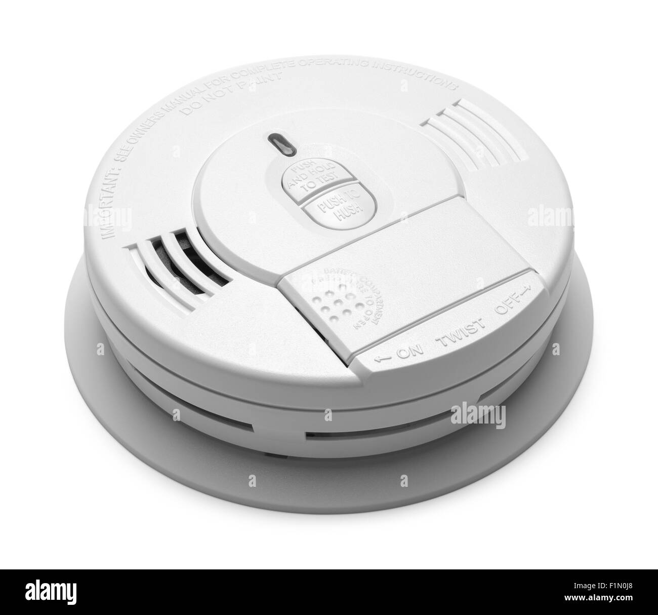 Round Plastic Smoke Detector Fire Alarm Isolated on White Background. Stock Photo