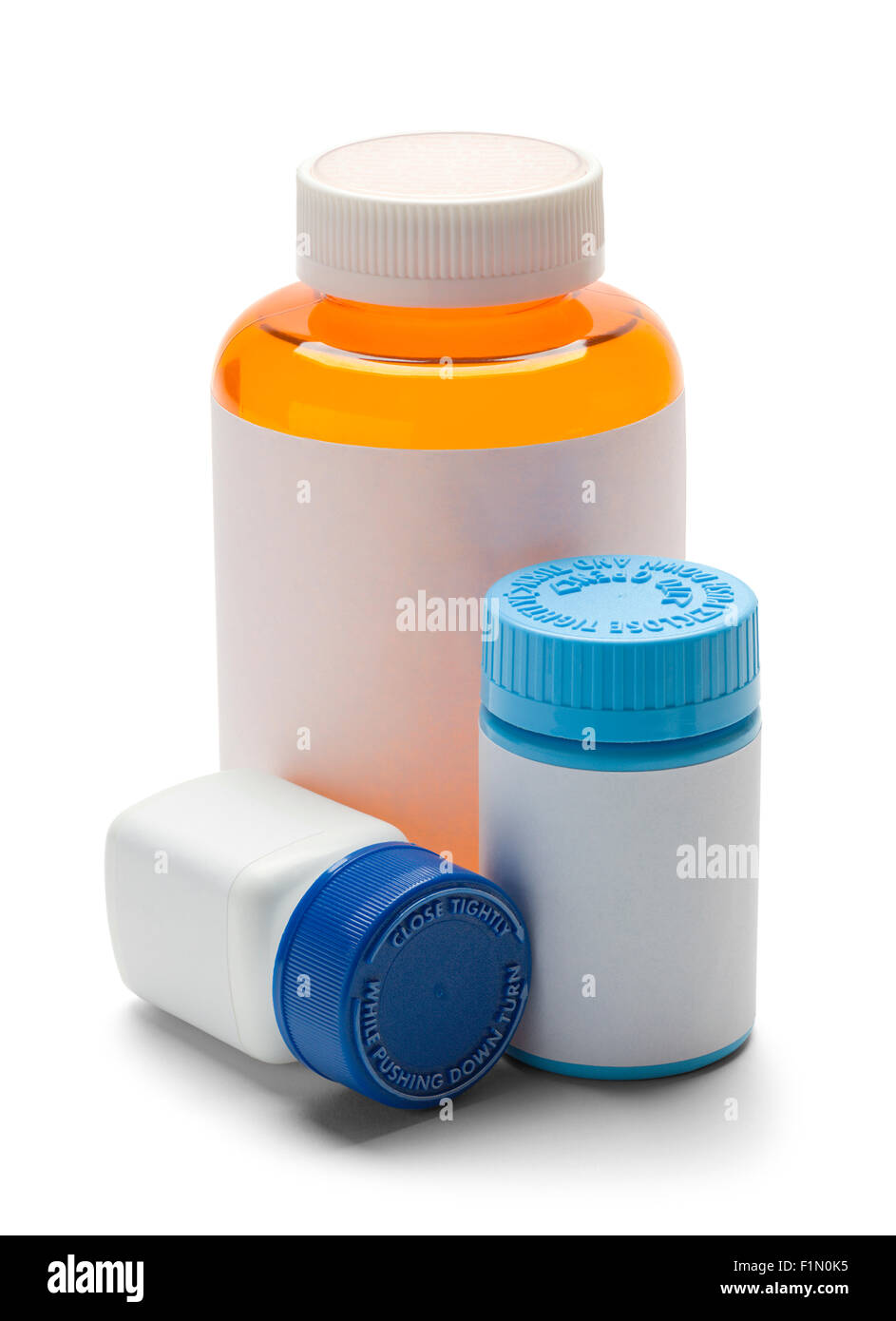 Three Medicine Bottles with Copy Space Isolated on White Background. Stock Photo