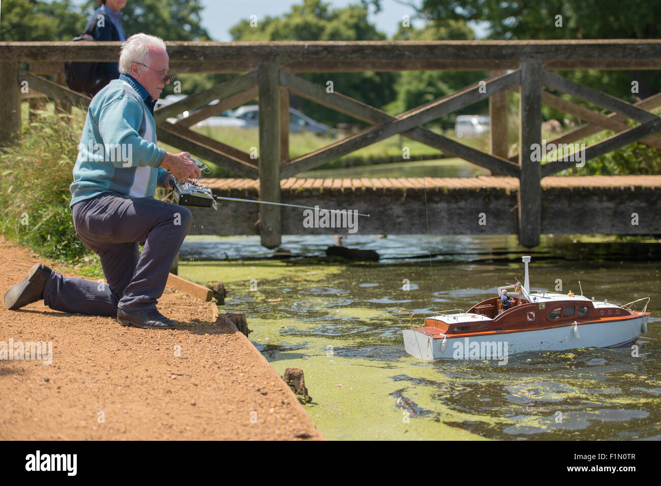 Older man with model boat Stock Photo