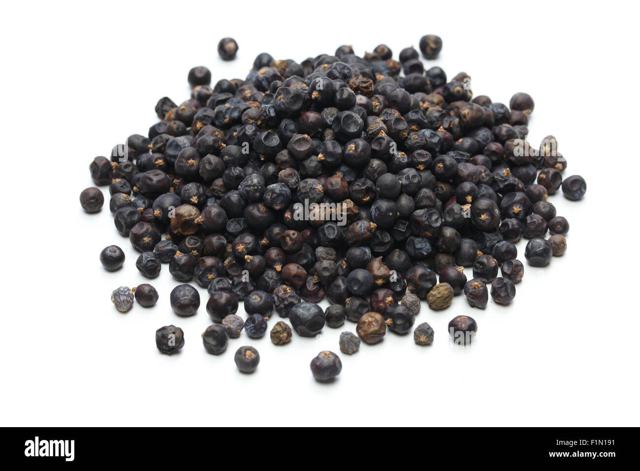 dried juniper berries on white background Stock Photo