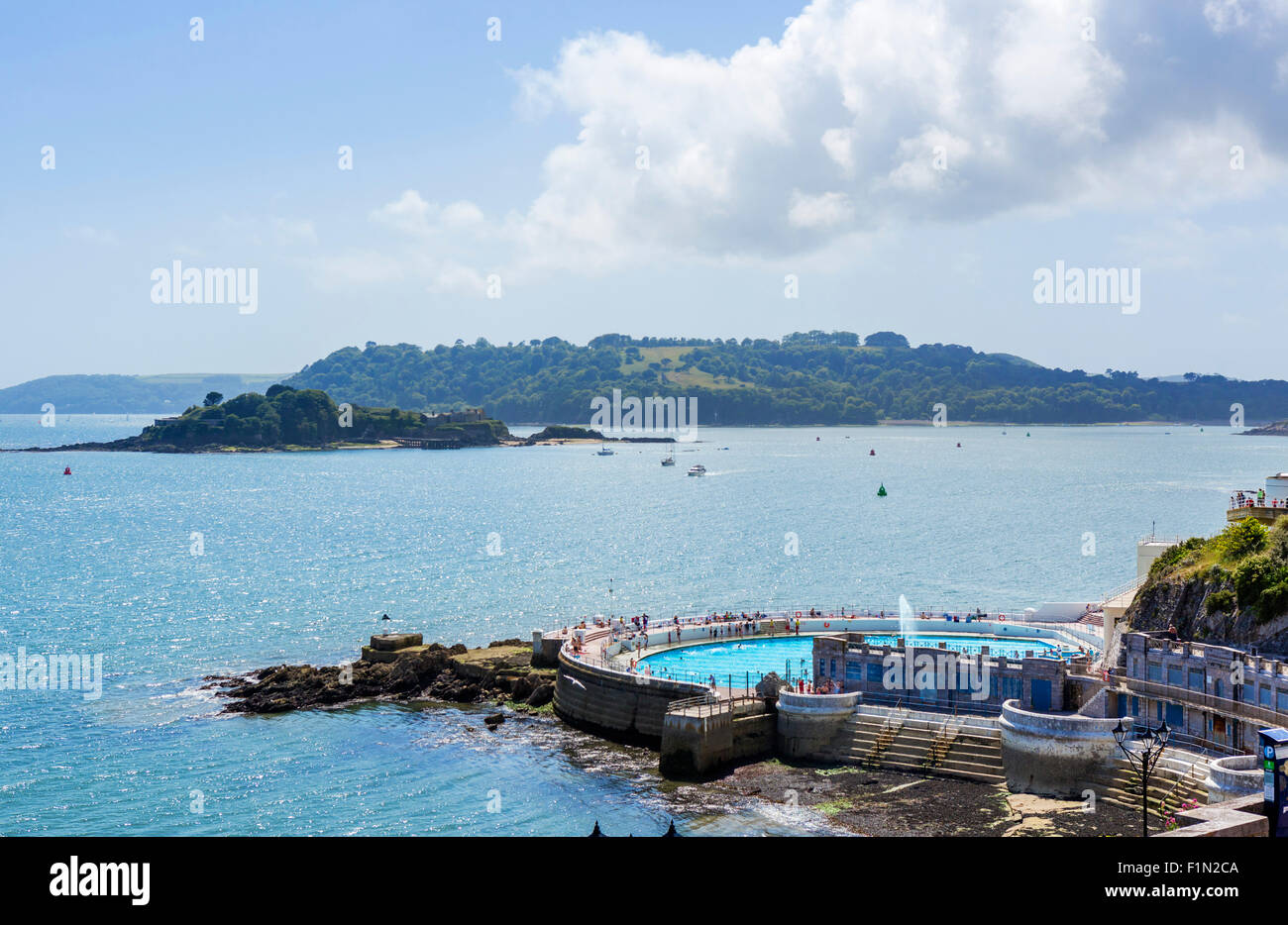 The 1930s Tinside Lido by the Hoe with Drake Island in the distance, Plymouth, Devon, England, UK Stock Photo