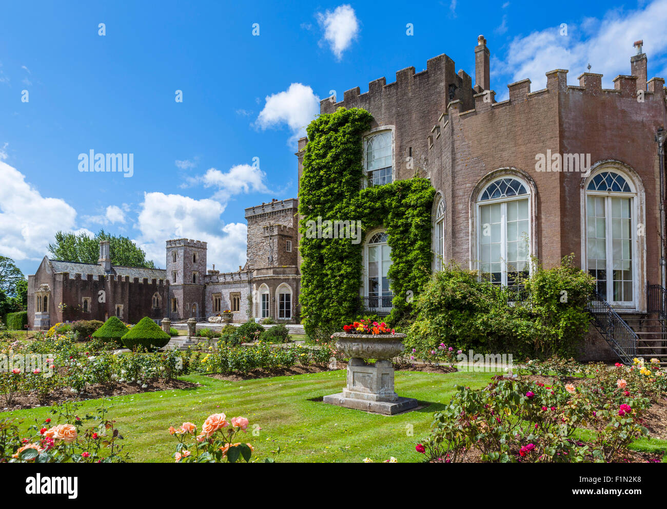 The house and gardens at historic Powderham Castle, Kenton, near Exeter, Devon, England UK Stock Photo