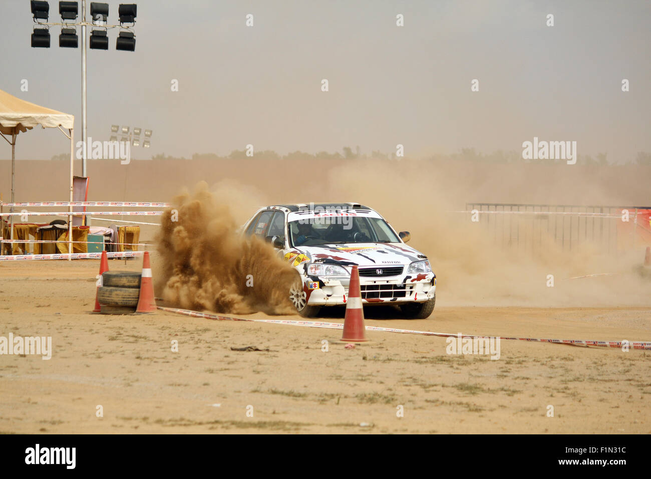 Cars drifting in mud at the Autocross 2014, bangalore, India Stock Photo