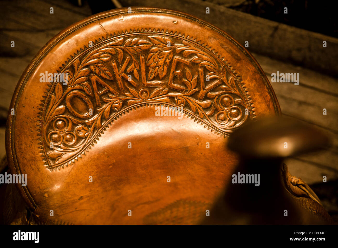 Annie Oakley's saddle with her last name embossed in the brown leather Stock Photo