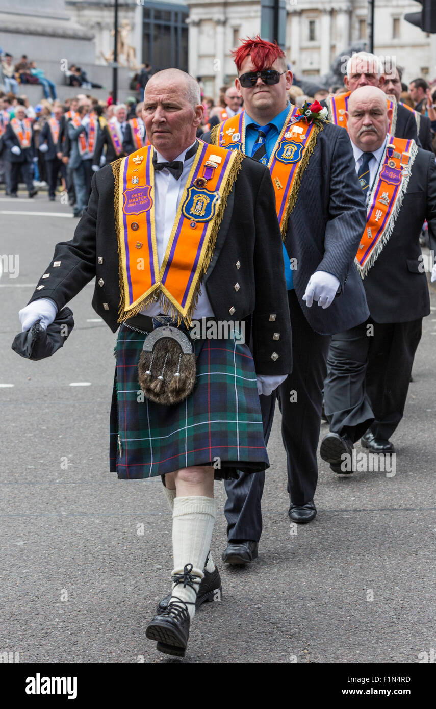 Loyal Orange Lodge members from Northern Ireland march through Trafalgar square on the day of the Trooping of the Colours Stock Photo