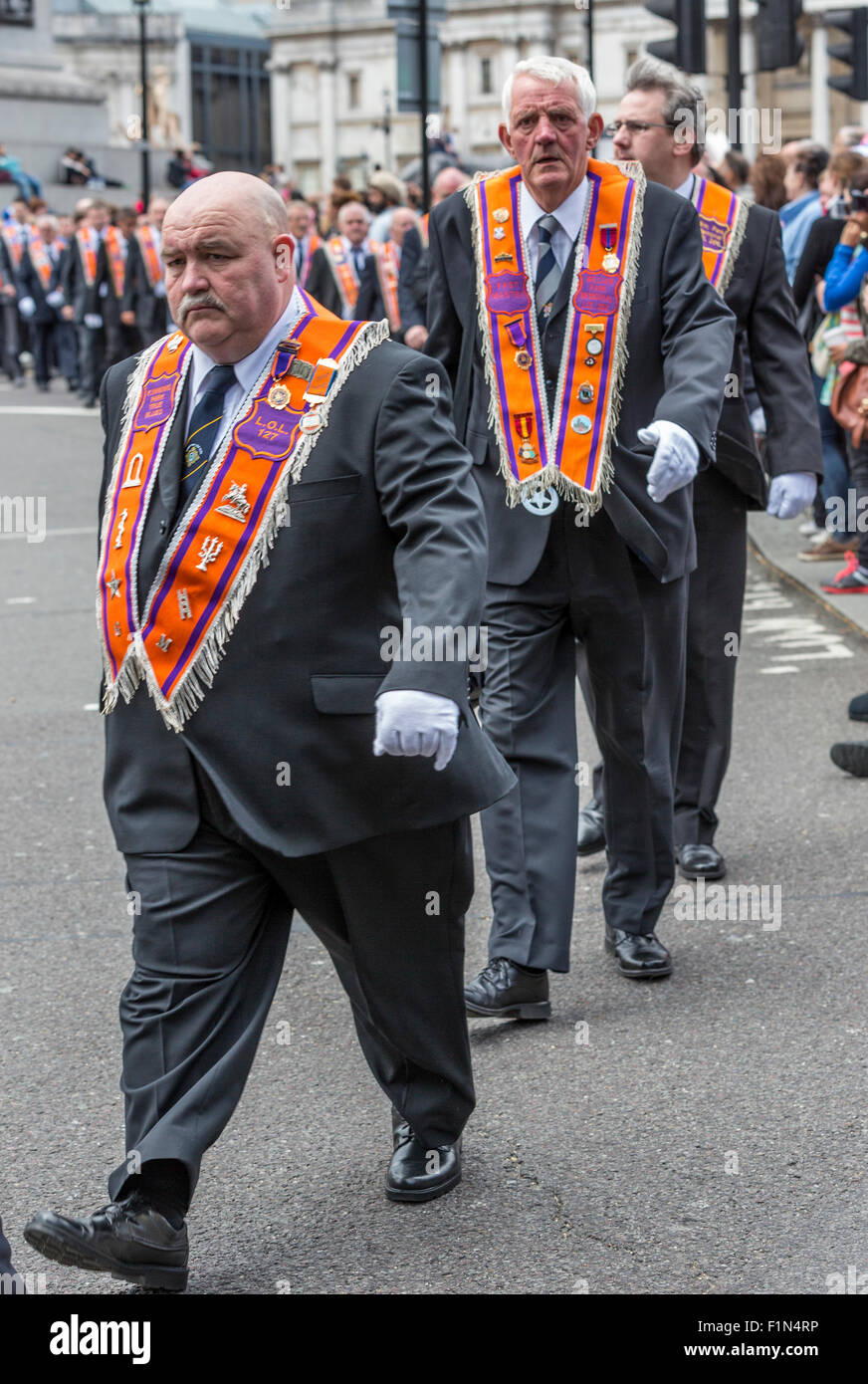 Loyal Orange Lodge members from Northern Ireland march through Trafalgar square on the day of the Trooping of the Colours Stock Photo