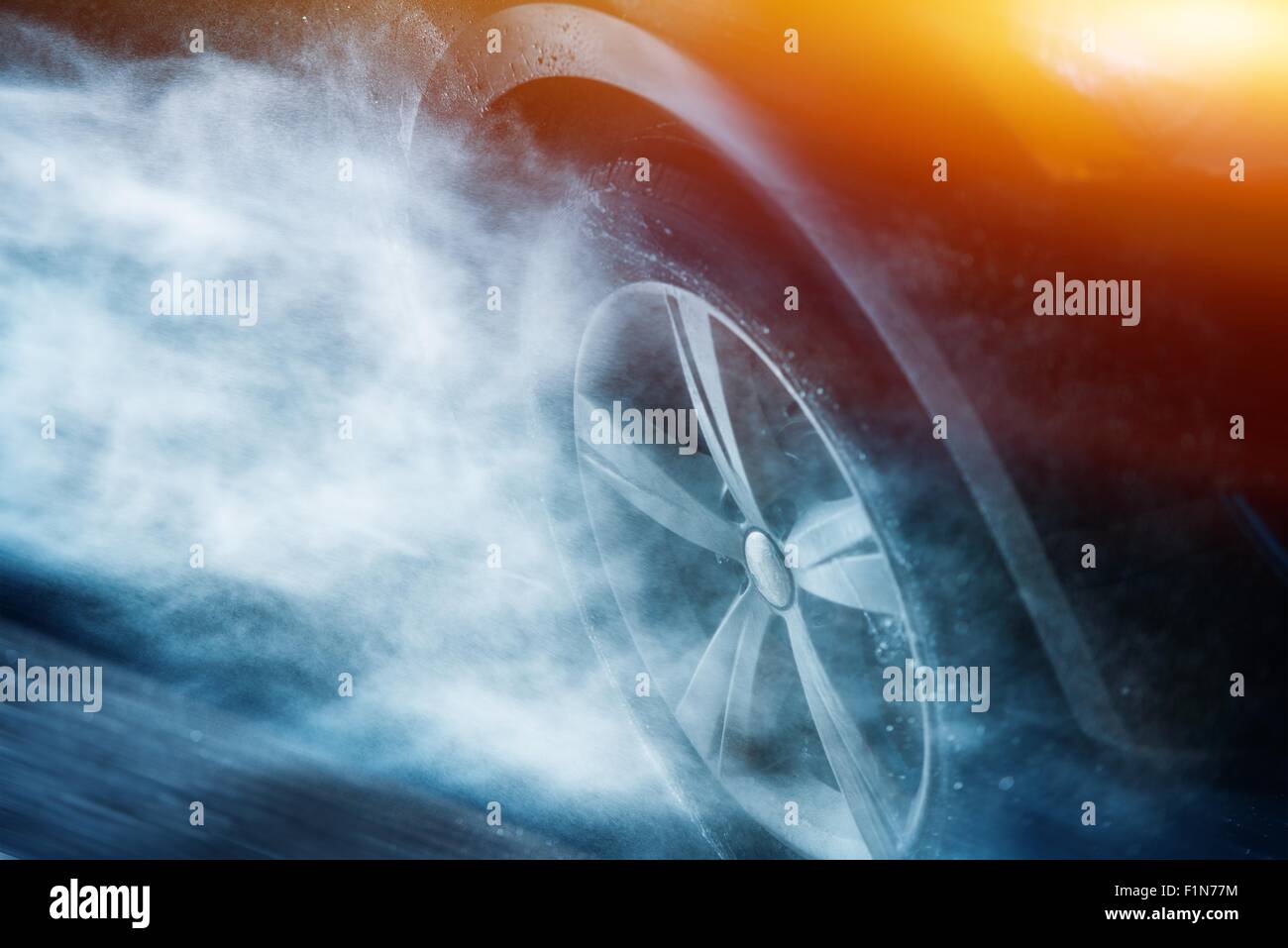 Heavy Rain Driving. Driving Aquaplaning or Hydroplaning Concept. Car Wheel in the Rainstorm. Stock Photo