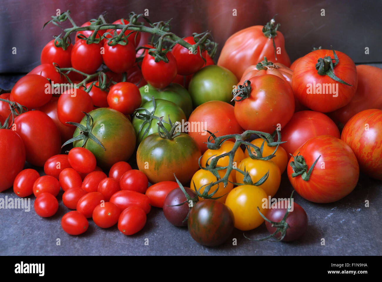 Tomatoes of different colours Stock Photo