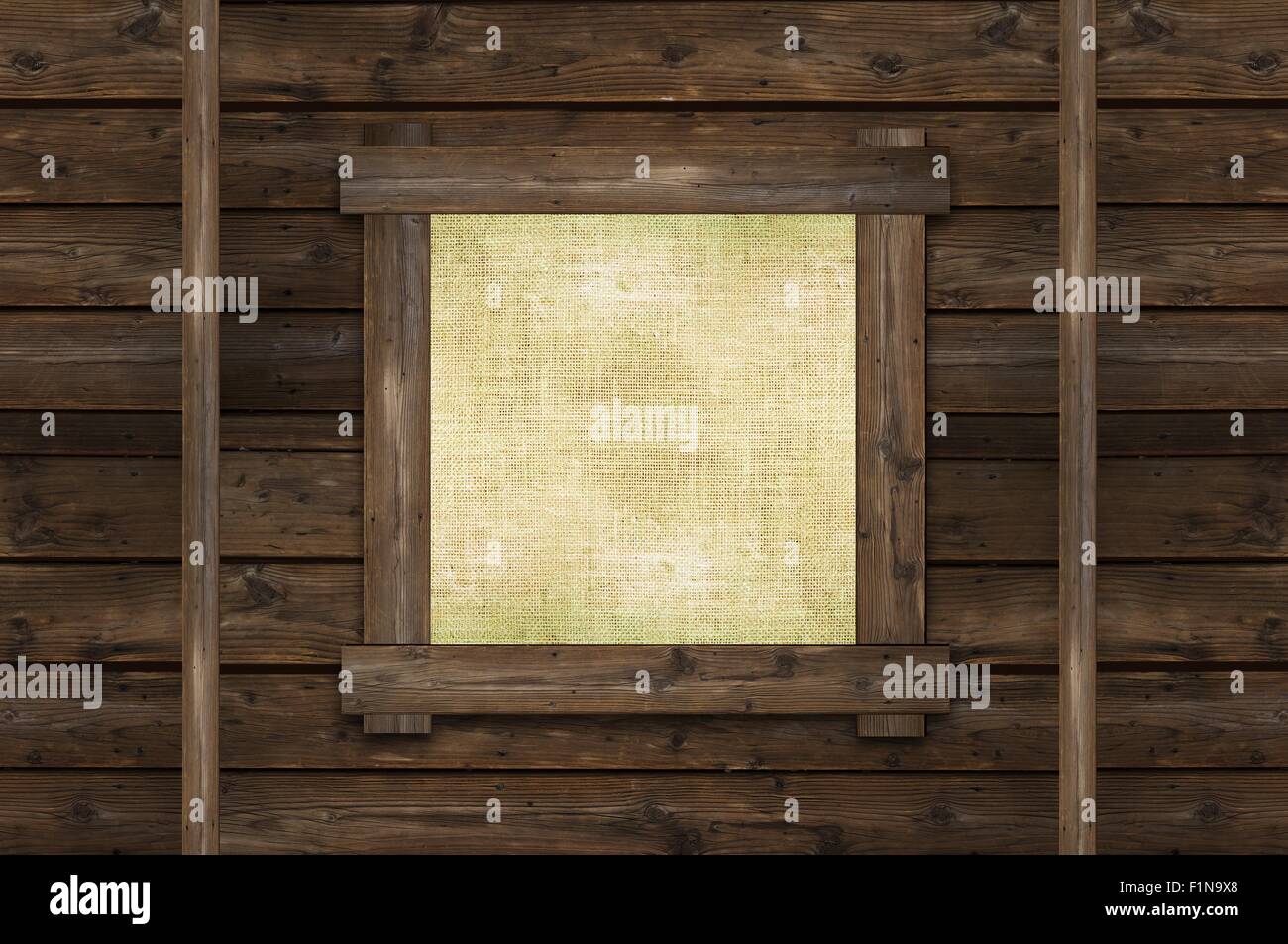 Blank Wall Canvas Frame on Vintage Reclaimed Wood Wall. Wooden Background with Copy Space on Canvas. Stock Photo