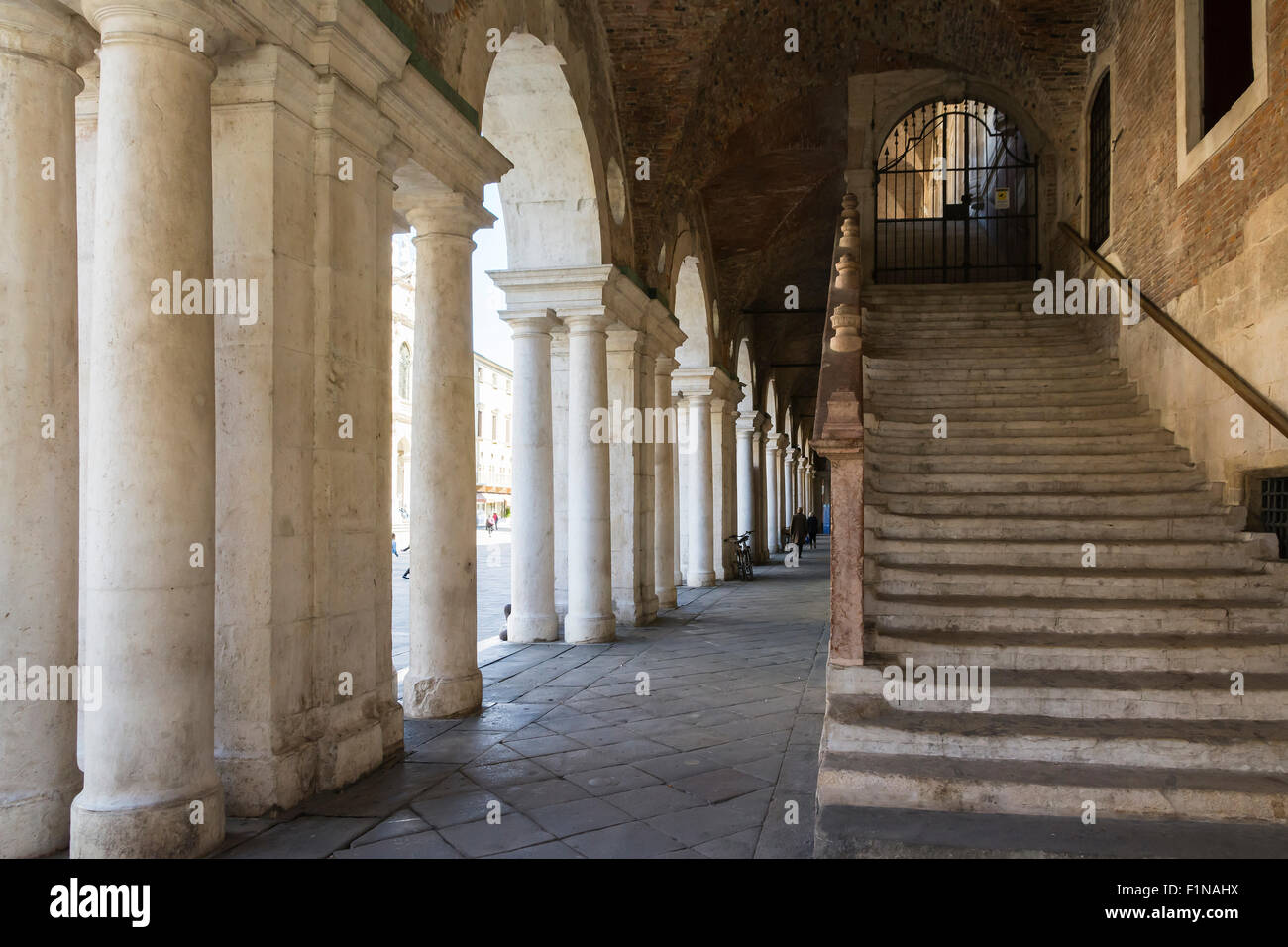 Vicenza,Italy-April 3,2015:view of the particular of the colonnade of the Palladian basilica in the center of Vicenza during a s Stock Photo