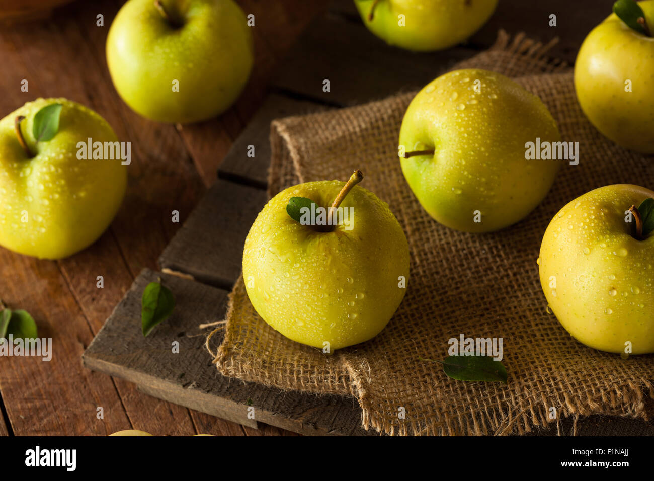 Raw Organic Golden Delicious Apples Ready to Eat Stock Photo