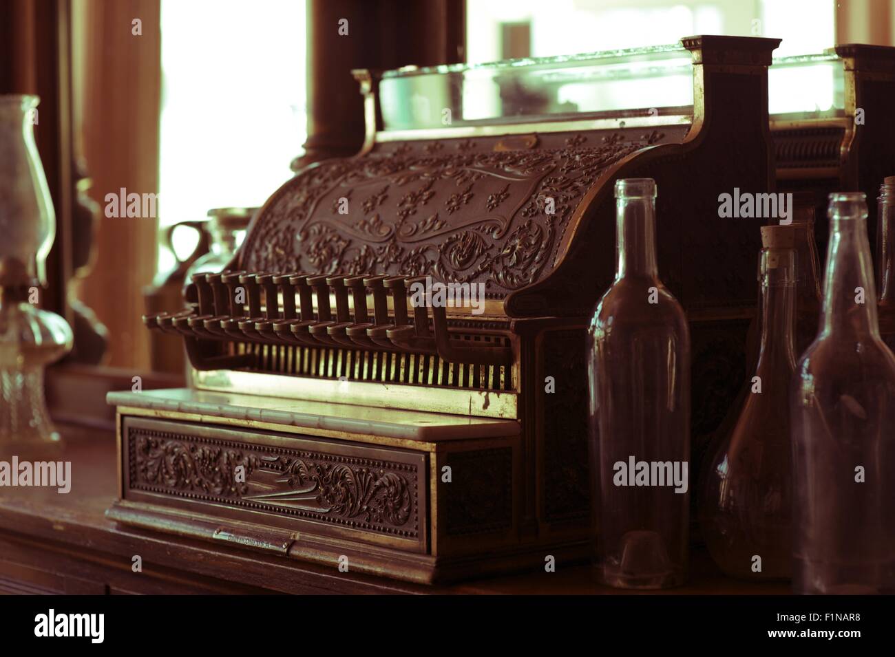 Vintage Cash Register in Old Western Store. Vintage Photo Collection. Stock Photo