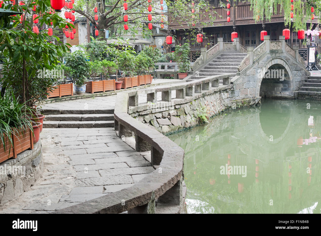 Traditional stone chinese bridge with chinese lanterns, Jinli, Chengdu, Sichuan Province, China Stock Photo