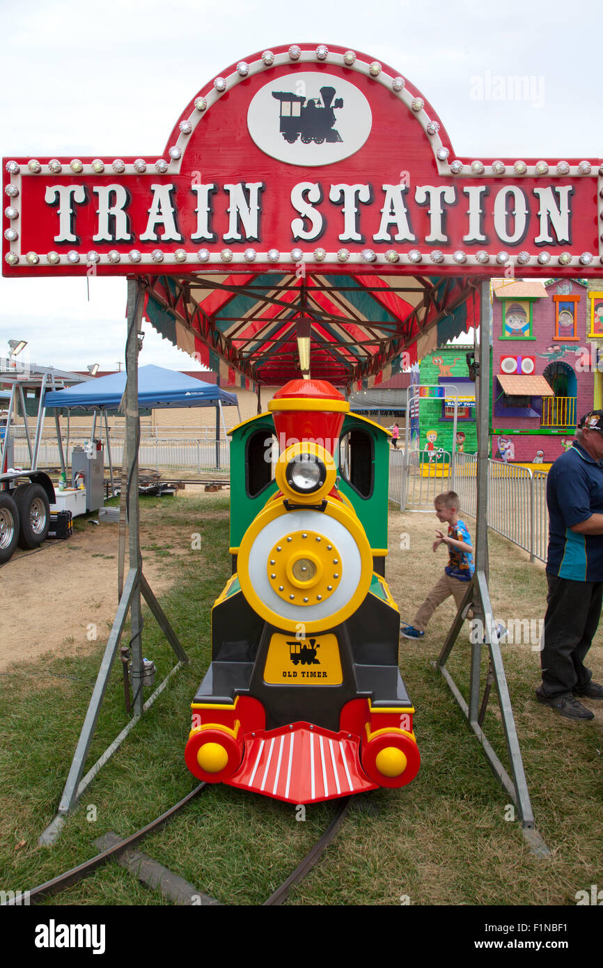 Children's train ride and sign at the Fair, US, 2015. Stock Photo