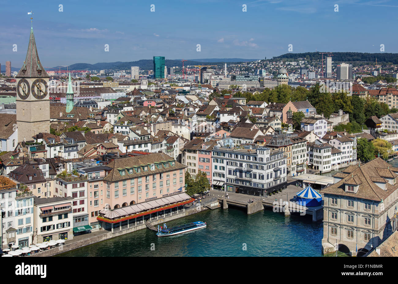 Zurich, Switzerland - 31 August, 2015: view from the tower of the Grossmunster cathedral with the 'Felix' ship at pier at the ho Stock Photo