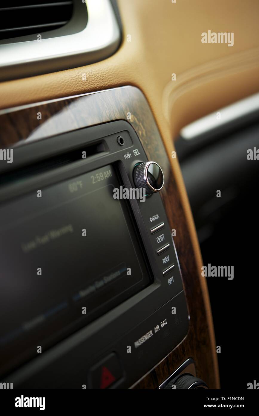 InDash Car Audio System Details Photo. Modern Vehicle Leather Interior