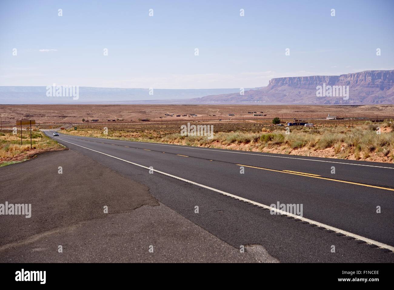 Somewhere in Arizona, USA. Arizona State Landscape with Highway. Hot Summer Day in Indian Reservation. Travels Photo Collection Stock Photo
