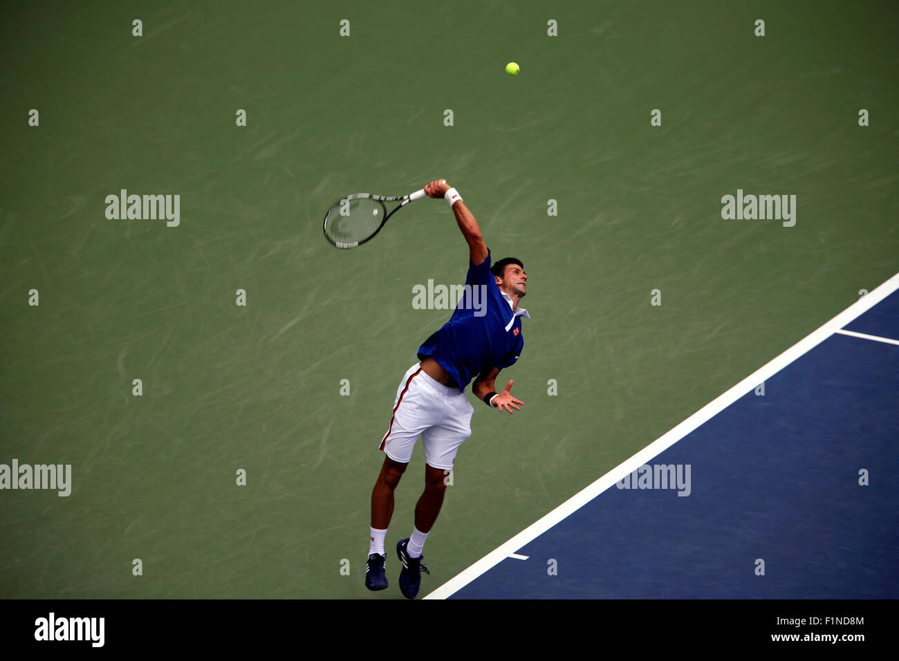 New York, USA. 4th September, 2015. Novak Djokovic serving during his third round match against Andreas Seppi of Italy at the U.S. Open in Flushing Meadows, New York on September 4th, 2015. Credit:  Adam Stoltman/Alamy Live News Stock Photo