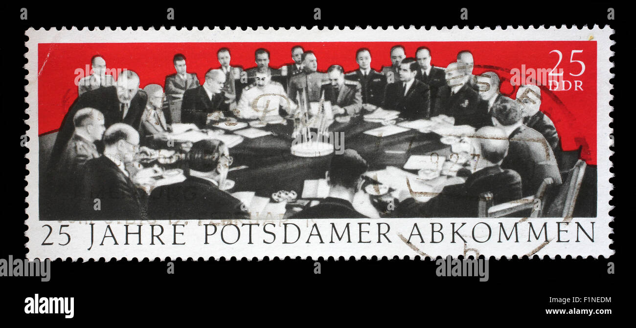 Stamp printed in GDR dedicate 25th anniv. of the Potsdam Agreement among the Allies concerning Germany at th Stock Photo