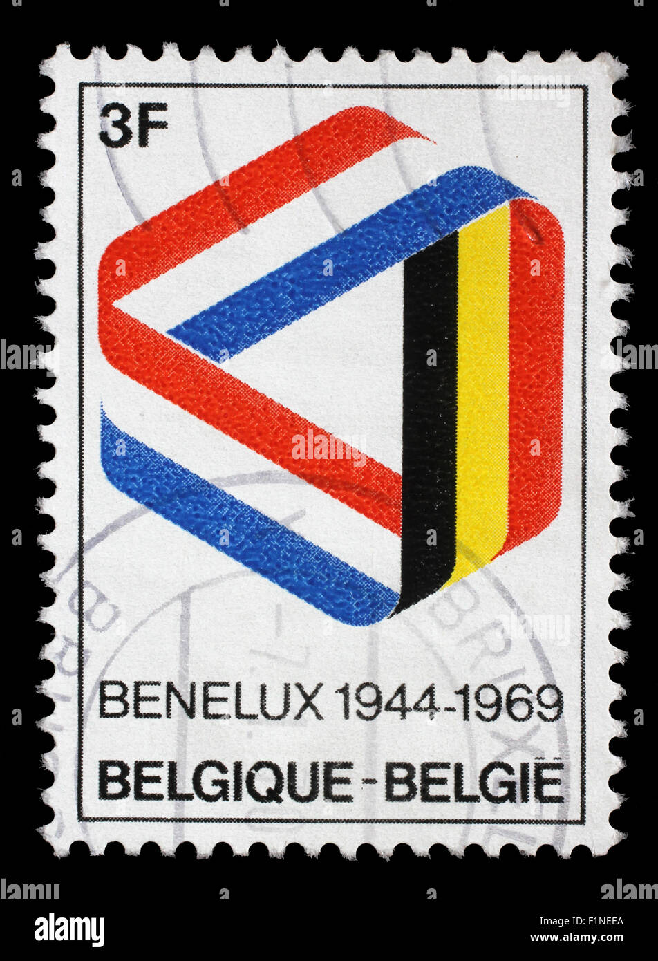 Stamp printed in the Belgium shows Mobius Strip in Benelux Colors, 25th Anniversary of the Customs Union, circa 1969 Stock Photo