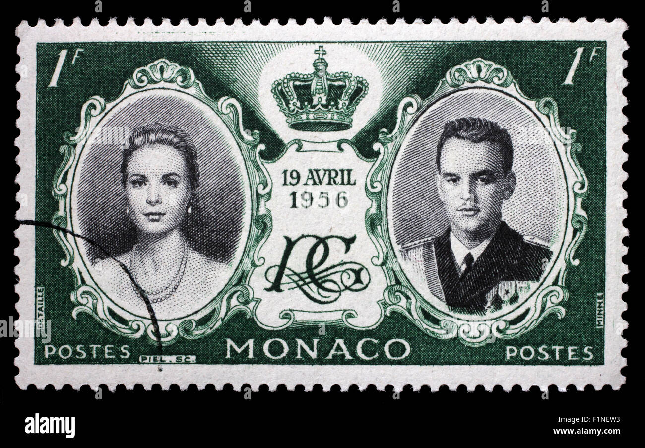Stamp printed in Monaco with portrait of Grace Kelly and Prince Rainier to commemorate their marriage, circa 1956. Stock Photo