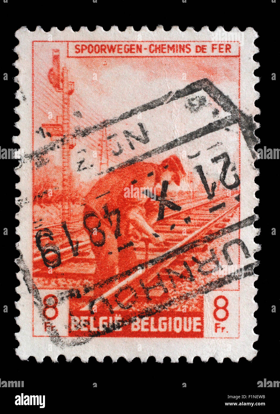 Stamp printed in Belgium shows Railway Worker from The Railway Company at Work issue, circa 1945. Stock Photo