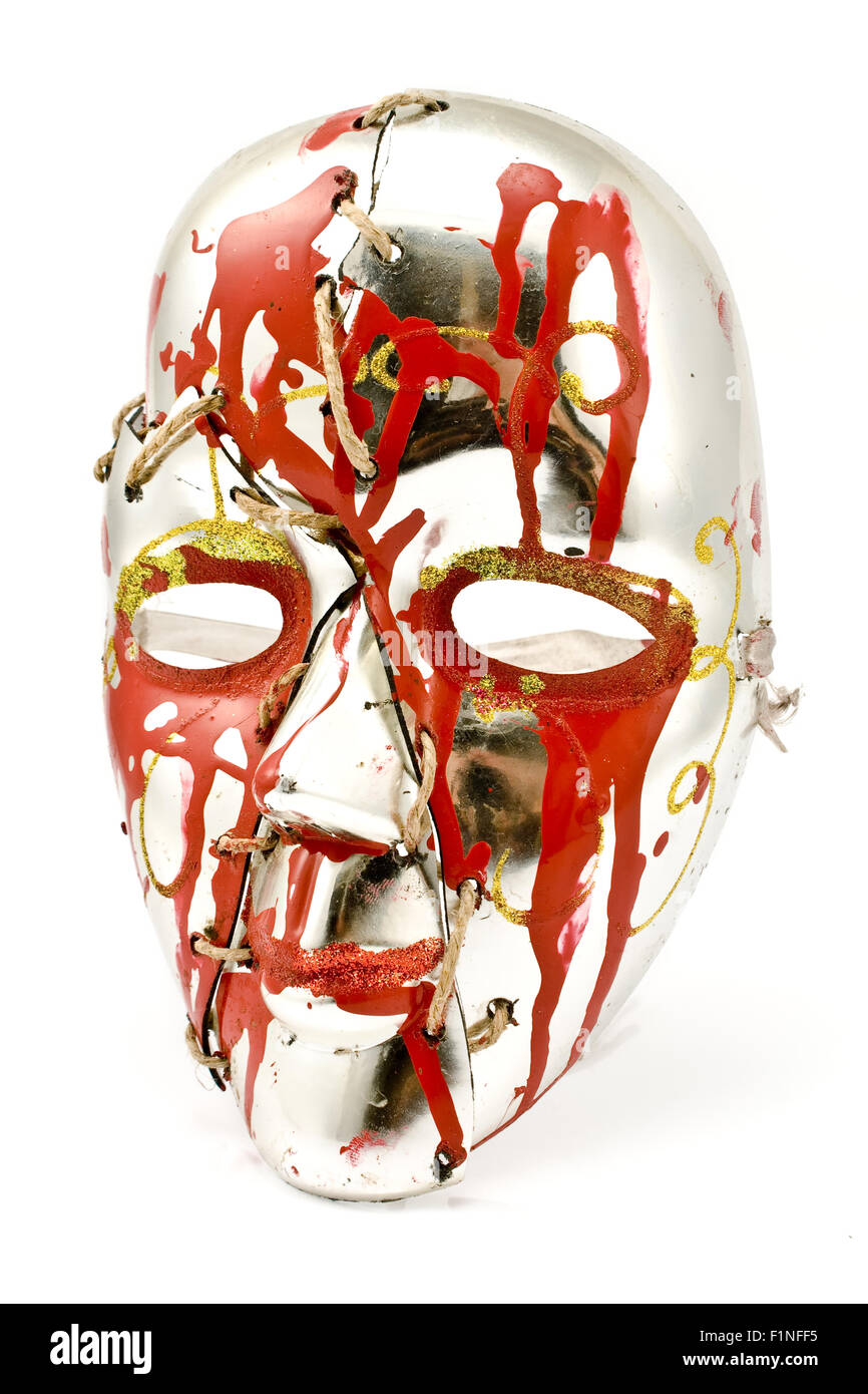 Broken and repaired carnival mask isolated on white Stock Photo