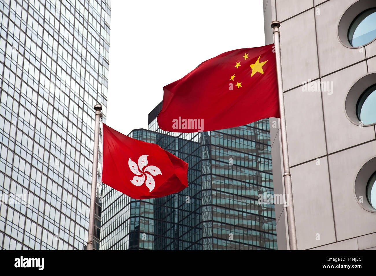 Hong Kong and China flags Stock Photo Alamy