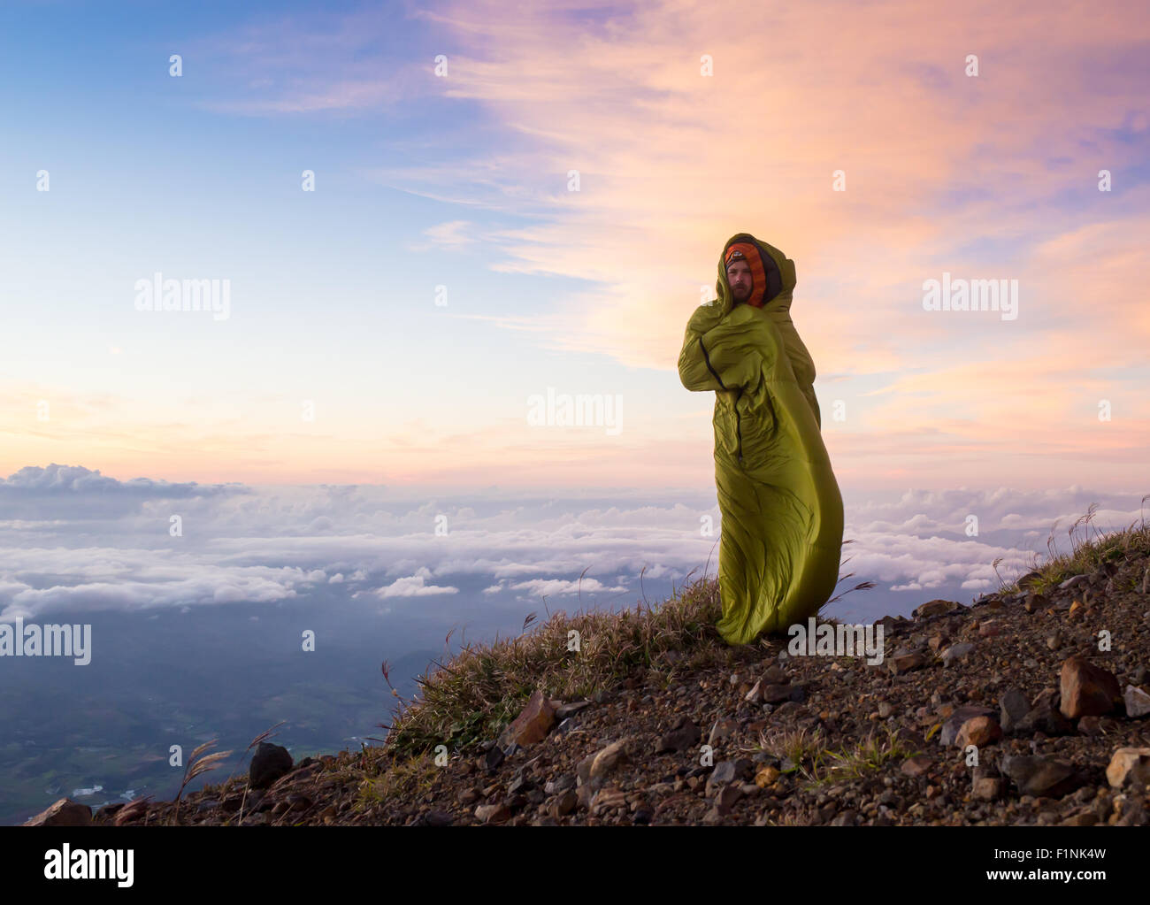 girl sits on the edge of cliff Stock Photo - Alamy