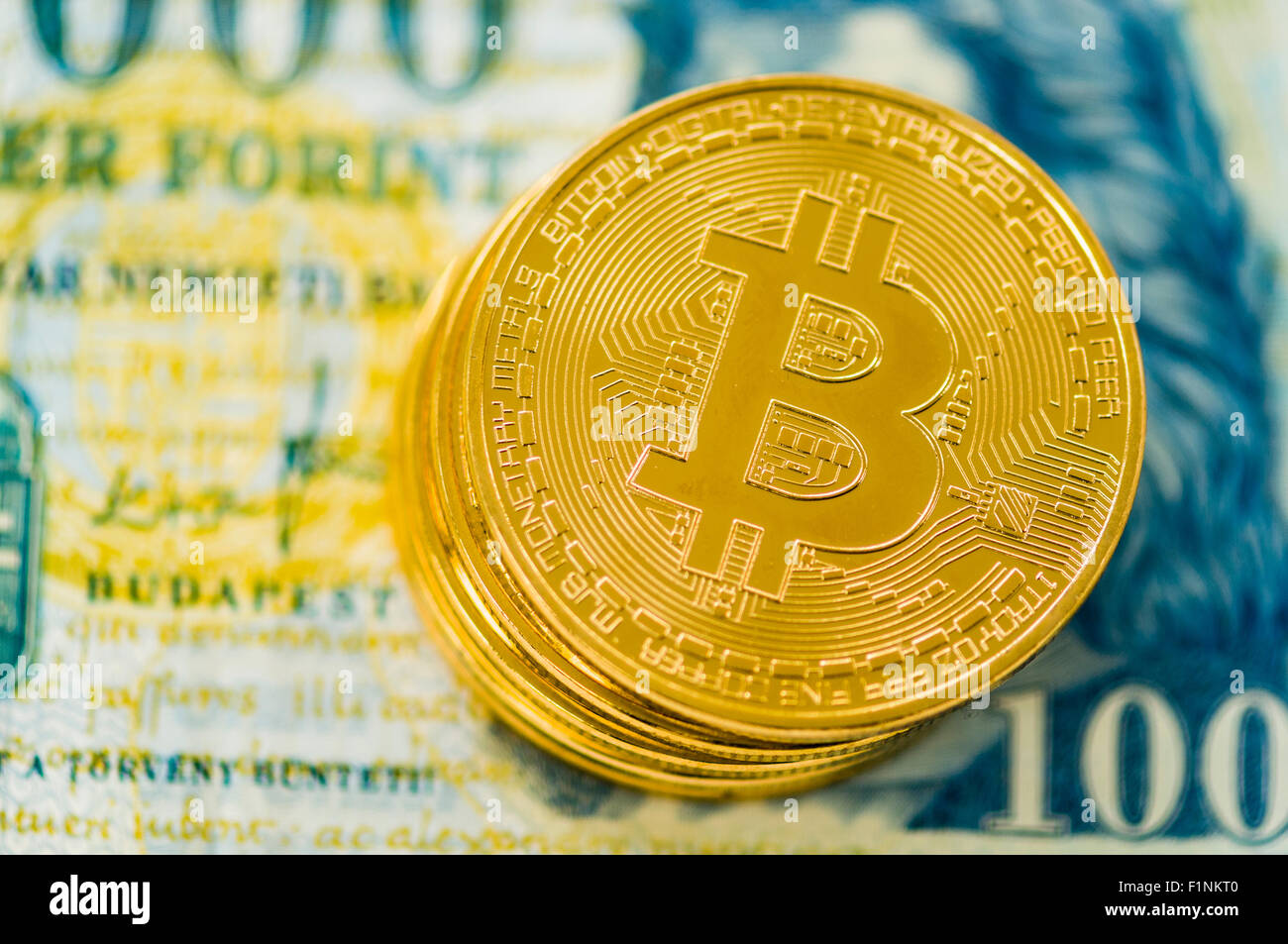 Bitcoins on a Hungarian Forint banknote Stock Photo