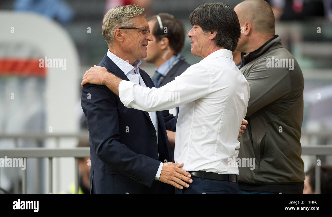Germany head coach Joachim Loew (R) greets Poland's coach Adam Nawalka at the Group D qualifier for the European Championships at the Commerzbank-Arena in Frankfurt am Main, Germany, 4 September 2015. PHOTO: FEDERICO GAMBARINI/DPA Stock Photo