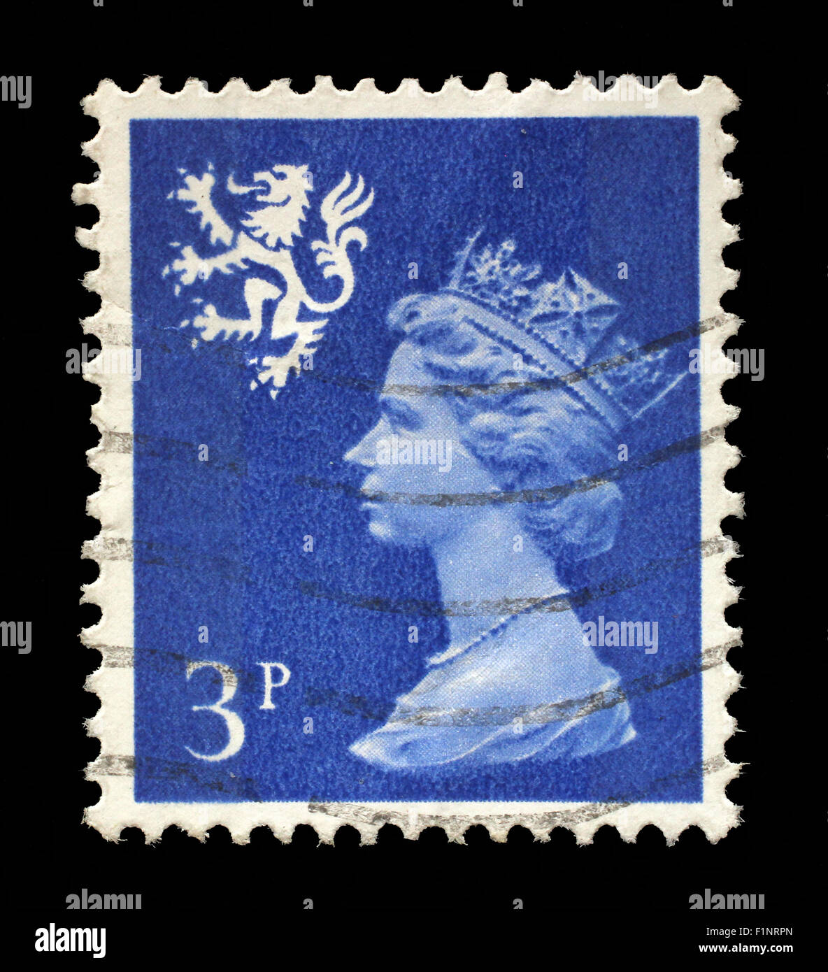 A Scottish Used Postage Stamp showing Portrait of Queen Elizabeth 2nd, circa 1958 to 1970 Stock Photo