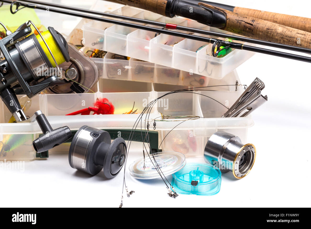 https://c8.alamy.com/comp/F1NW9Y/different-fishing-tackles-rod-reel-line-and-lures-in-box-on-white-F1NW9Y.jpg