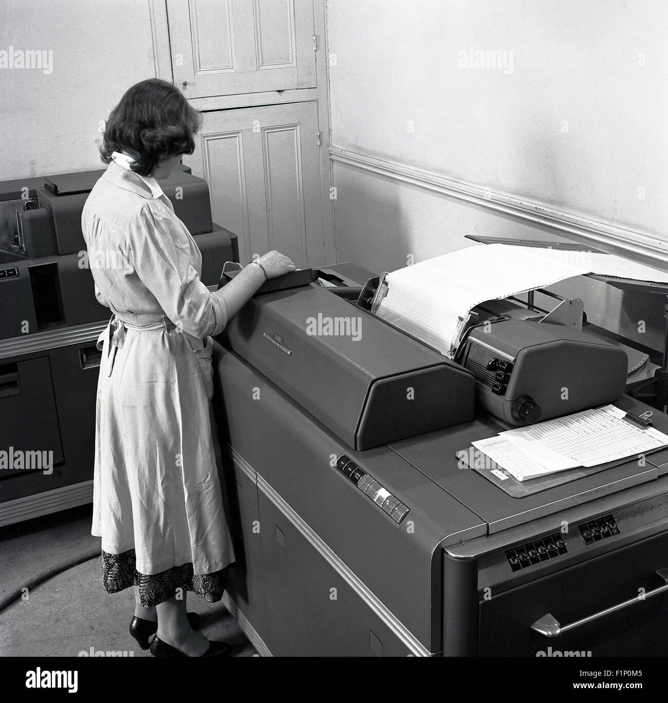 Marietta, Georgia: c. 1953 A woman in an office using an IBM 650